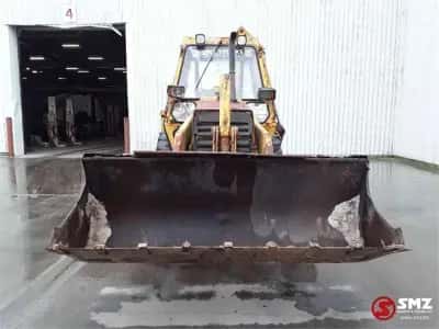 1990 Caterpillar 428 Backhoe Loader — photo 2 of 5