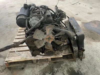 Toyota 4-cilinder benzinemotor - Impco LPG-installatie - Versnellingsbak - Radiator - Uitlaat - Achteras - Cardanflens — photo 9 of 12