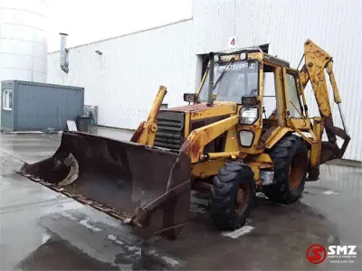 1990 Caterpillar 428 Laad-graafcombinatie — photo 3 of 5