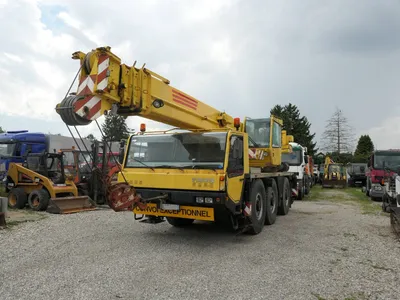1997 Tadano Faun RTF 40-3 — photo 1 of 12